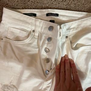 White cropped jeans with holes